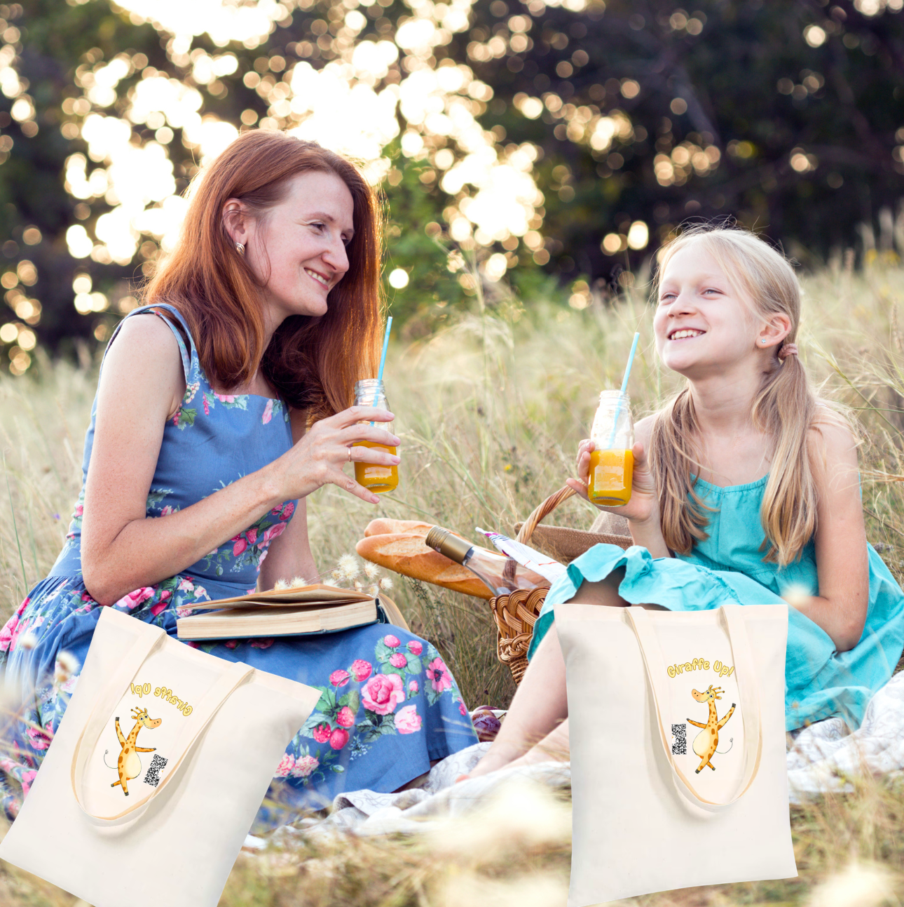Woman and her young daughter sitting in a field with picnic basket, enjoying a sunny day.