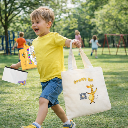 Child in a park holding The Brave Storytime Bundle's tote bag with Gertie the Giraffe book and coloring book, at the playground.